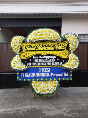 Papan Bunga Duka di Negeri Olok Gading